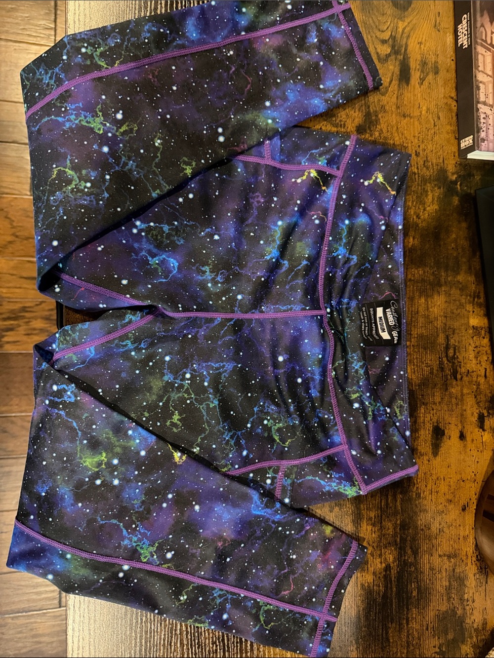 Constantly Varied Gear Capri Galaxy Leggings in Purple with Green & Blue Accents
